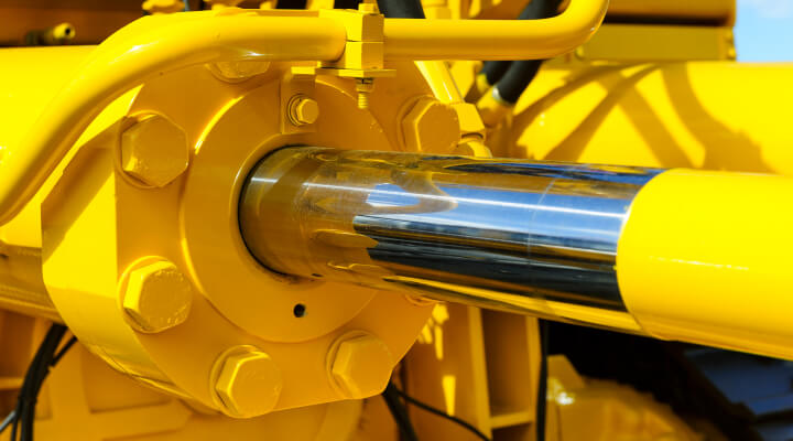A close-up of a hydraulic pump working under full load thanks to Kixx lubricant protection